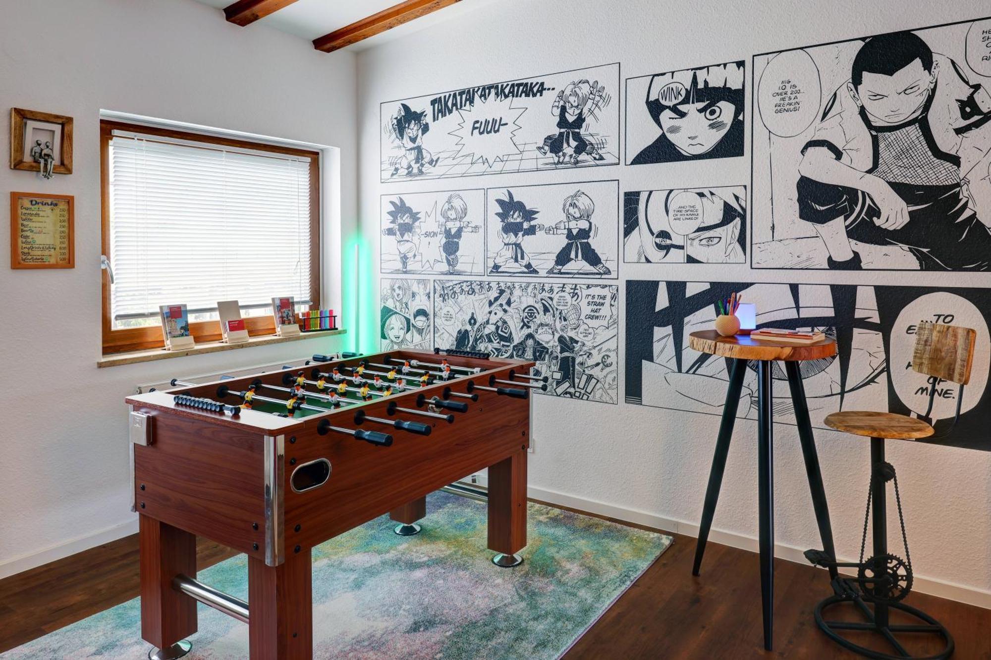 Hostel MHG Exteriör bild A foosball table