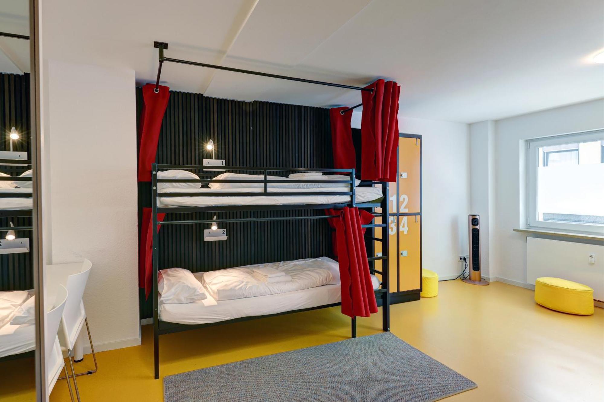 Hostel MHG Exteriör bild A typical room at a youth hostel